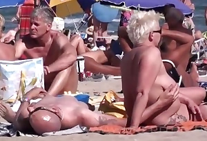 Sex in excess of someone's skin nudist beach