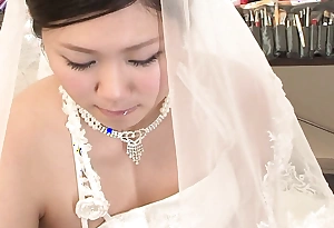 Brunette Emi Koizumi screwed masterful to forwards bridal rags uncensored.